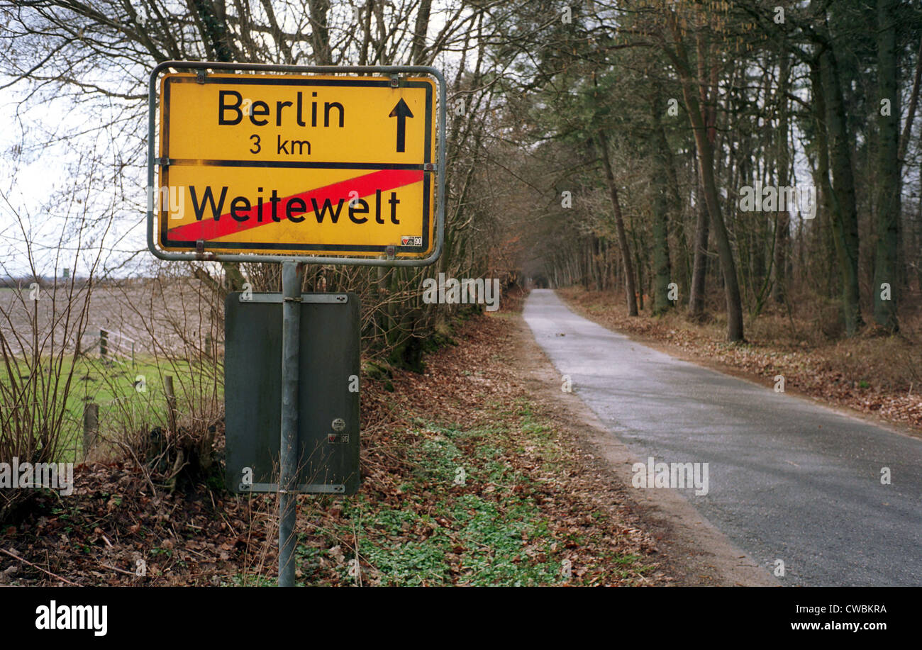 Wide world, sign towards Berlin Stock Photo