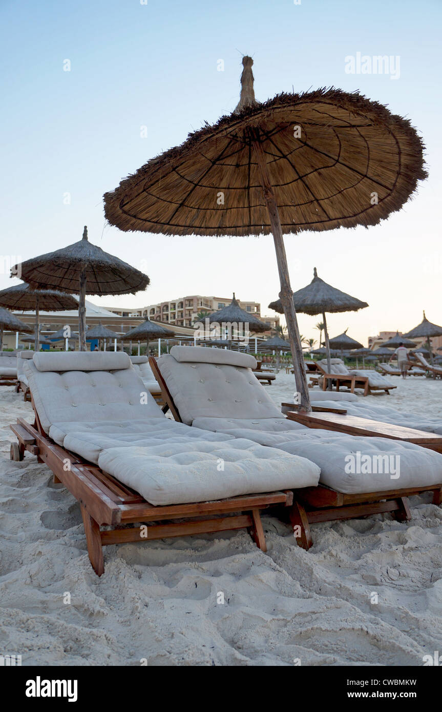 Beach umbrella and sun loungers hires stock photography and images Alamy