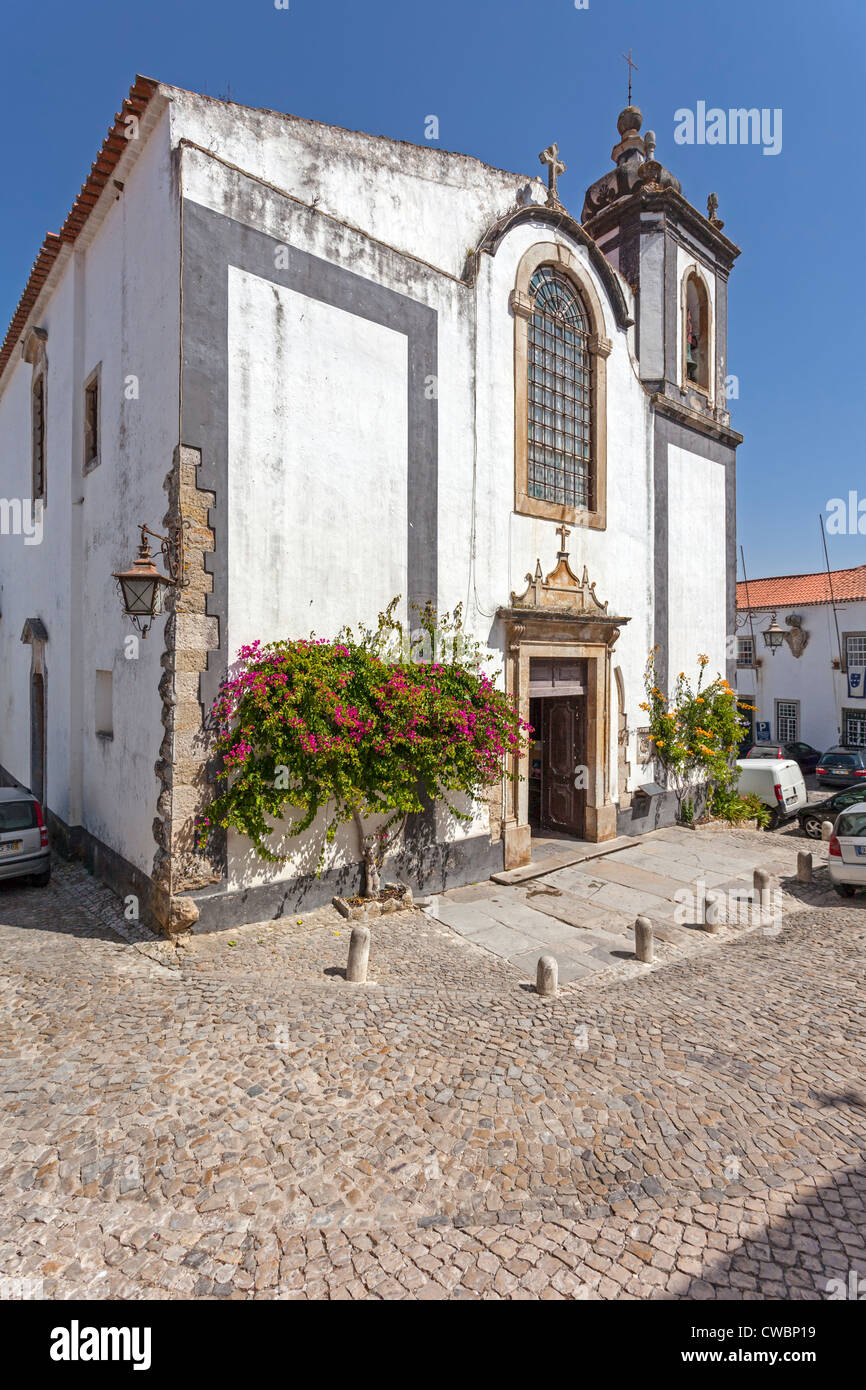 Sao Pedro church in Obidos. Obidos is a very well preserved medieval town, still inside the castle walls in Portugal. Stock Photo