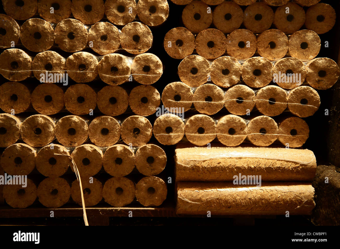 illustrative, compressed wood chips in plastic packaging, wooden