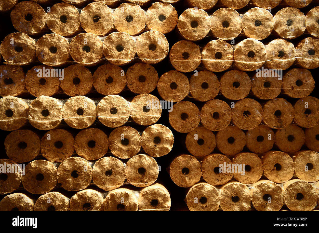 illustrative, compressed wood chips in plastic packaging, wooden