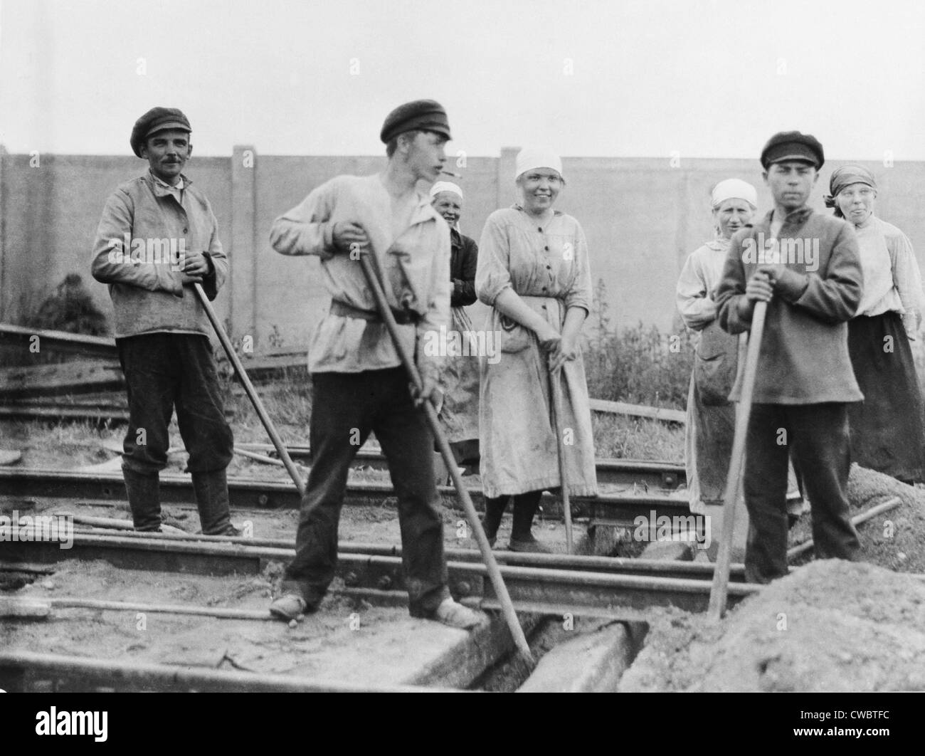 Russian men and women railroad track workers on the job in Petrograd