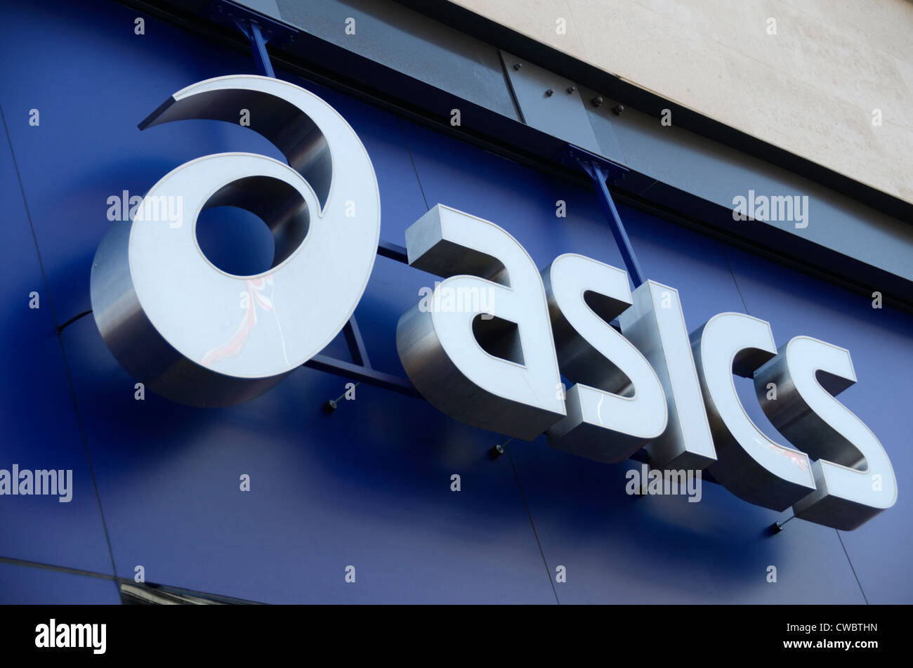Basics fashion shop sign logo, London, England Stock Photo - Alamy