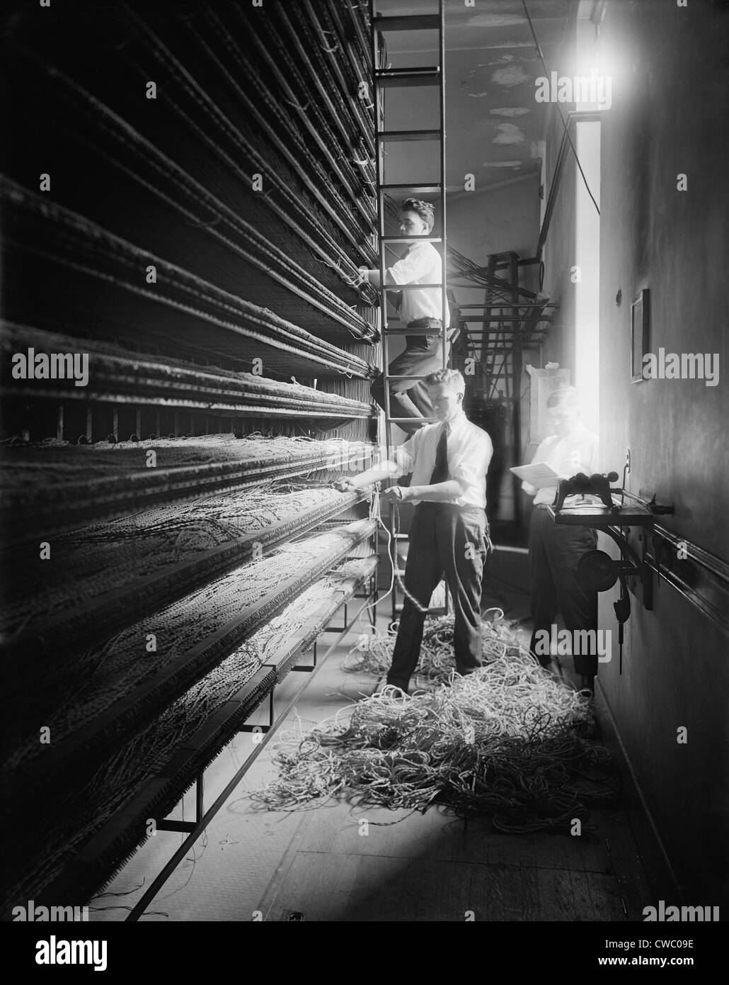 Chesapeake and Potomac Telephone Company wiring installed on tiers of shelving in Washington, D.C. area, ca. 1925. Stock Photo