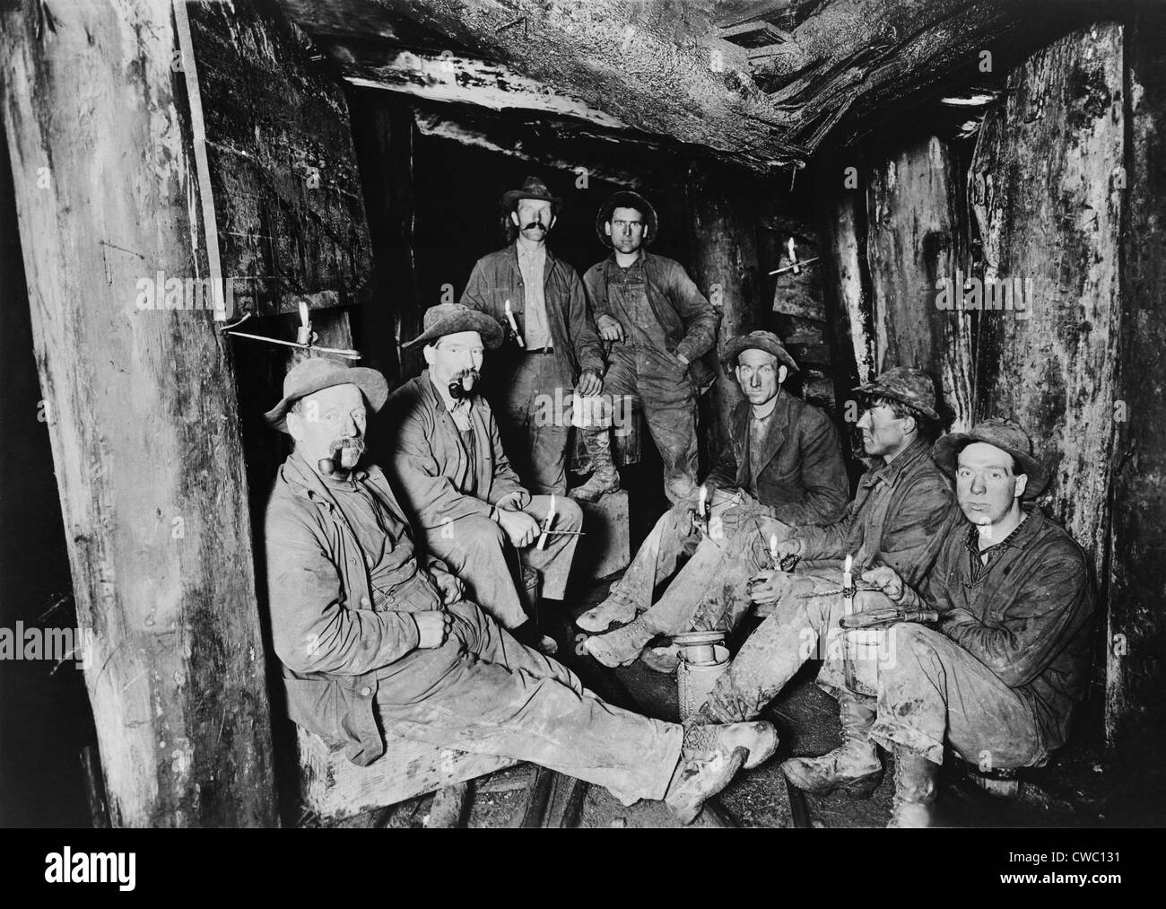 Seven miners pose for a photograph after lunch in the Last Chance Company mine in the Coeur d'Alene region of Idaho. The region Stock Photo