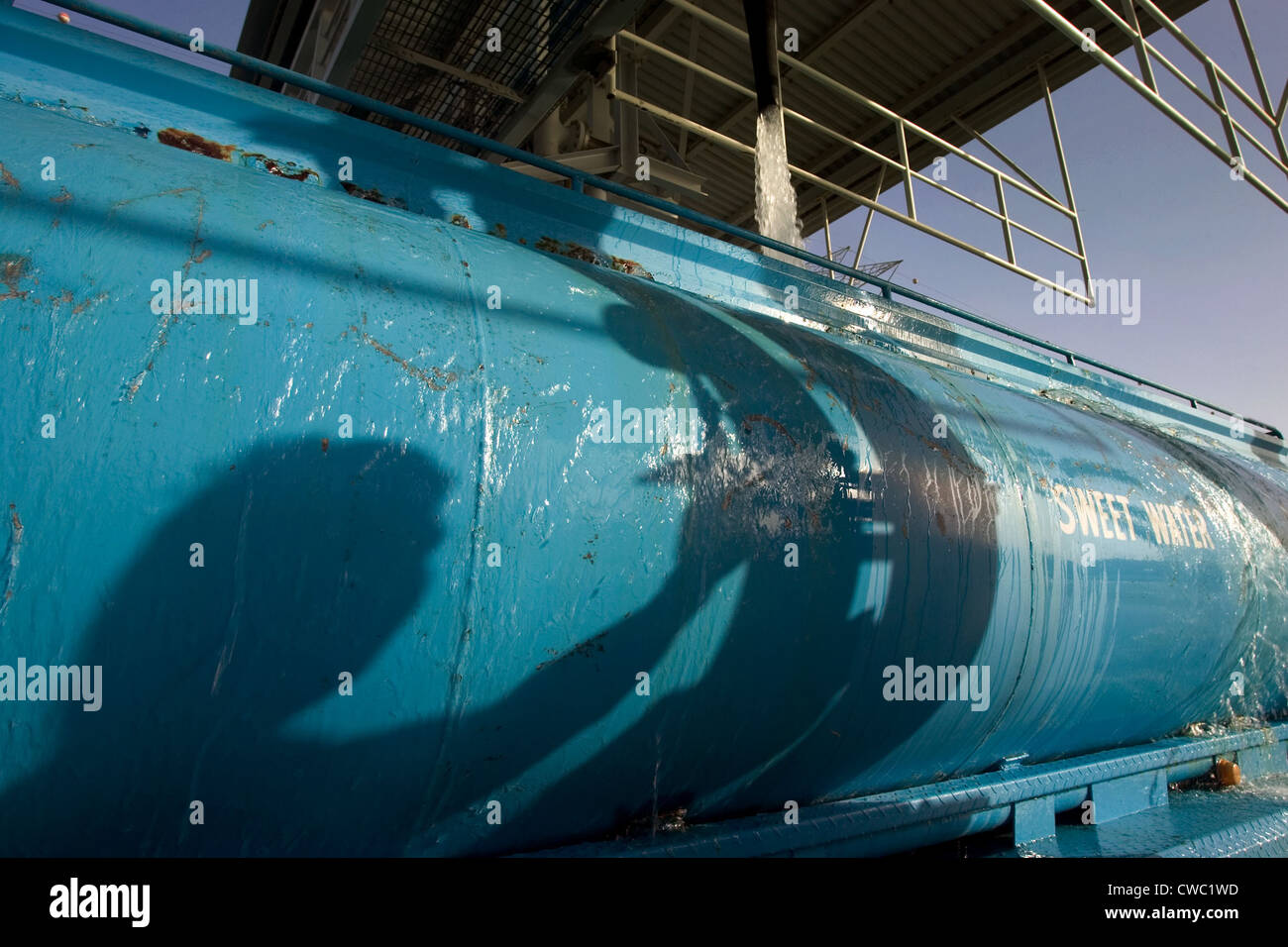 Dubai, a fuel truck is fueled with water Stock Photo