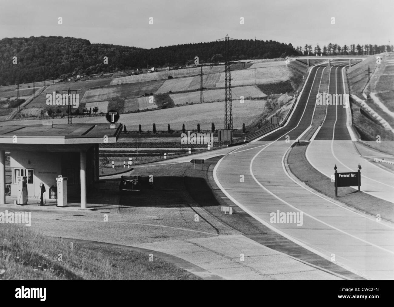 Service Station of the German Autobahn a four lane divided highway with entrance and exit ramps. Ca. 1938. LC-USZ62-128818 Stock Photo