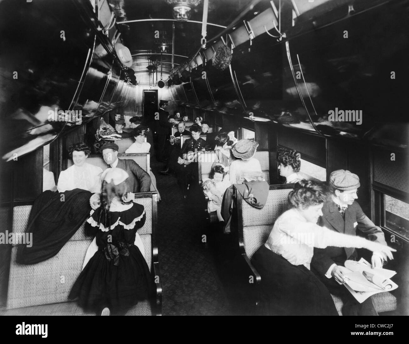 Passengers in an American Pullman railroad car in 1905. At the car's ...