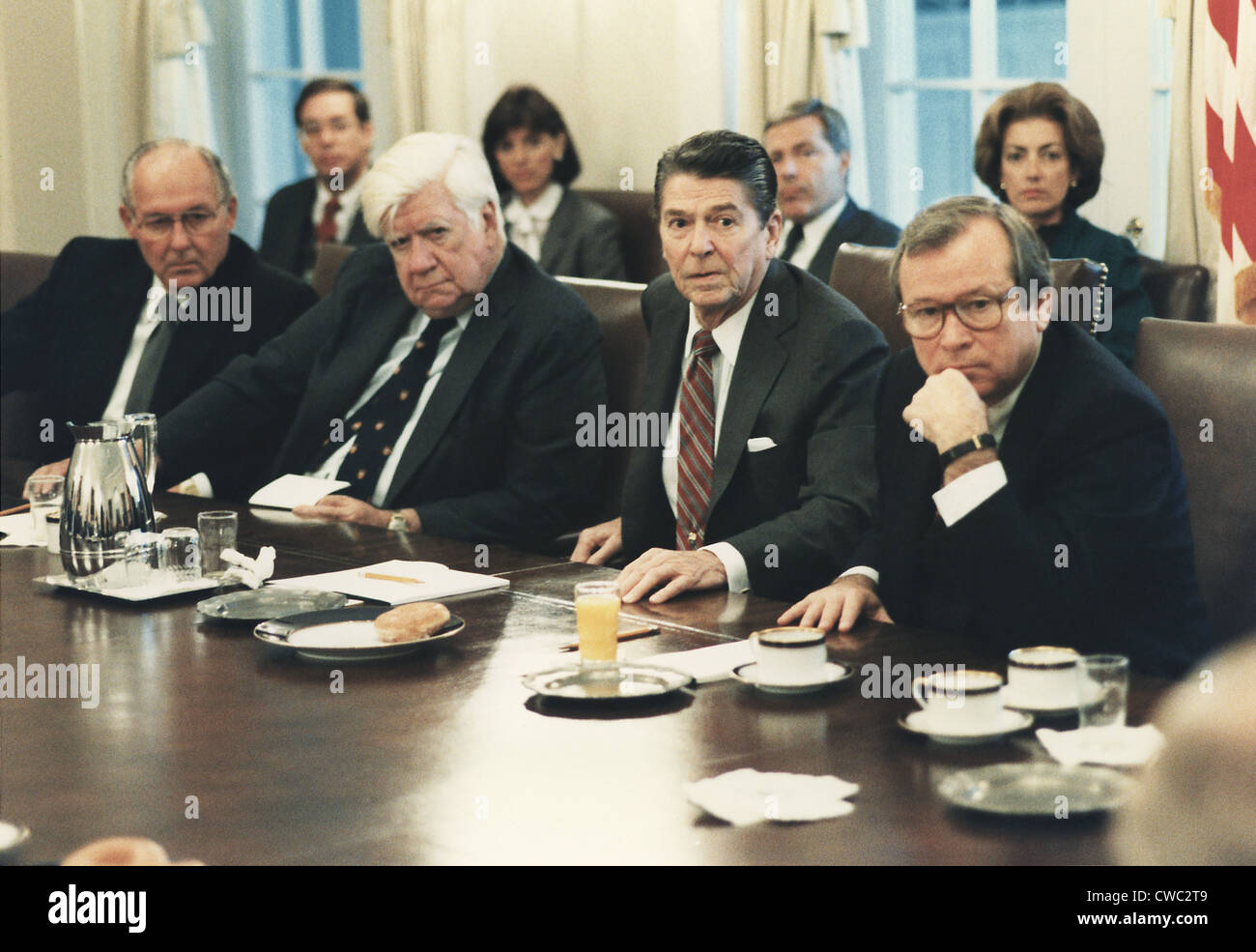 President Reagan meeting with Congress after the invasion of Grenada in the Cabinet Room. Reagan is flanked by Speaker of the Stock Photo