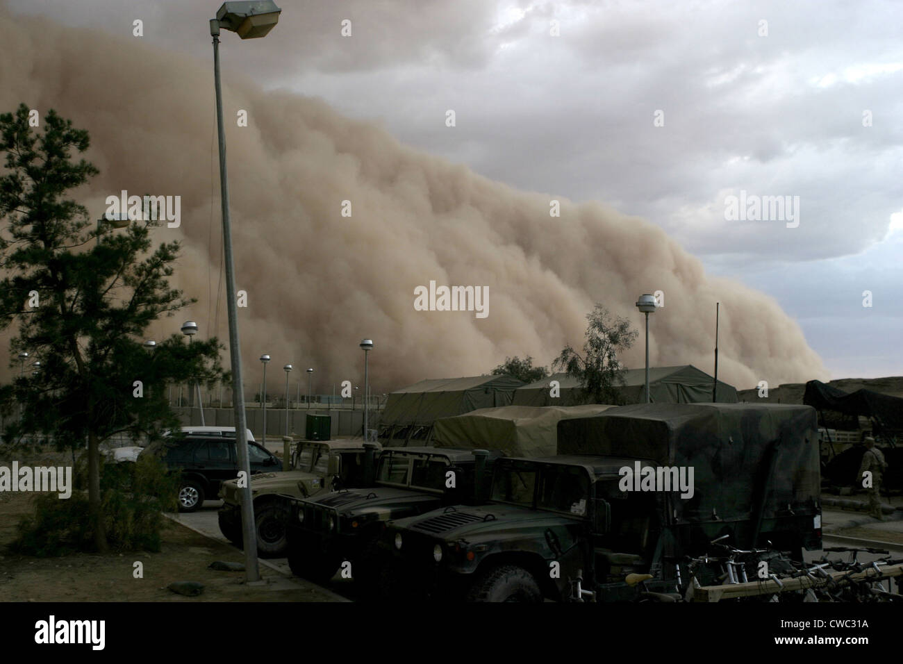 A massive sand storm envelopes a U.S. military camp in Al Asad Iraq. April 27 2005. (BSLOC 2011 3 2) Stock Photo