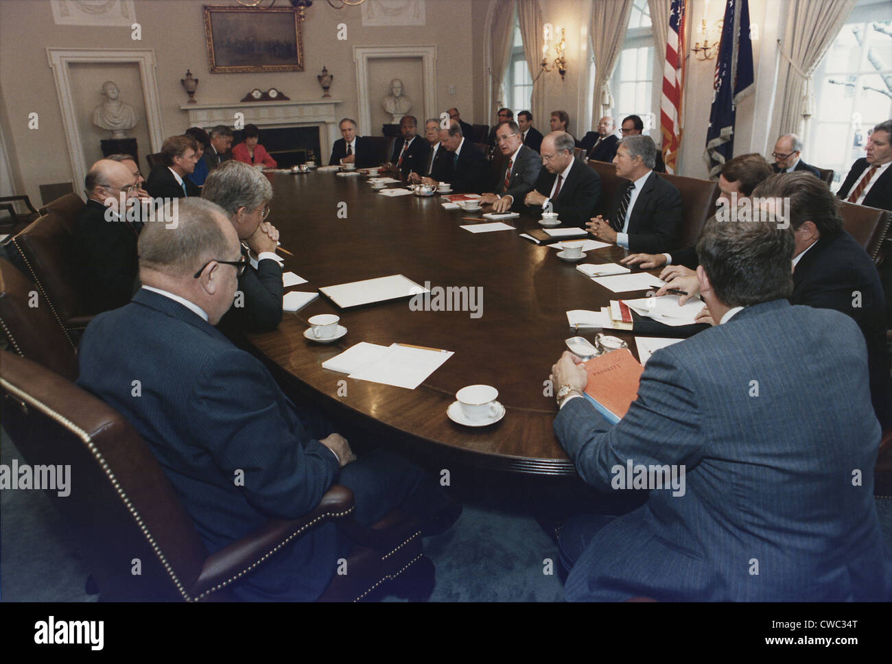 President George Bush conducts a full Cabinet Meeting in the White House Cabinet Room. 1989. Bush is seated between Sec. of Stock Photo