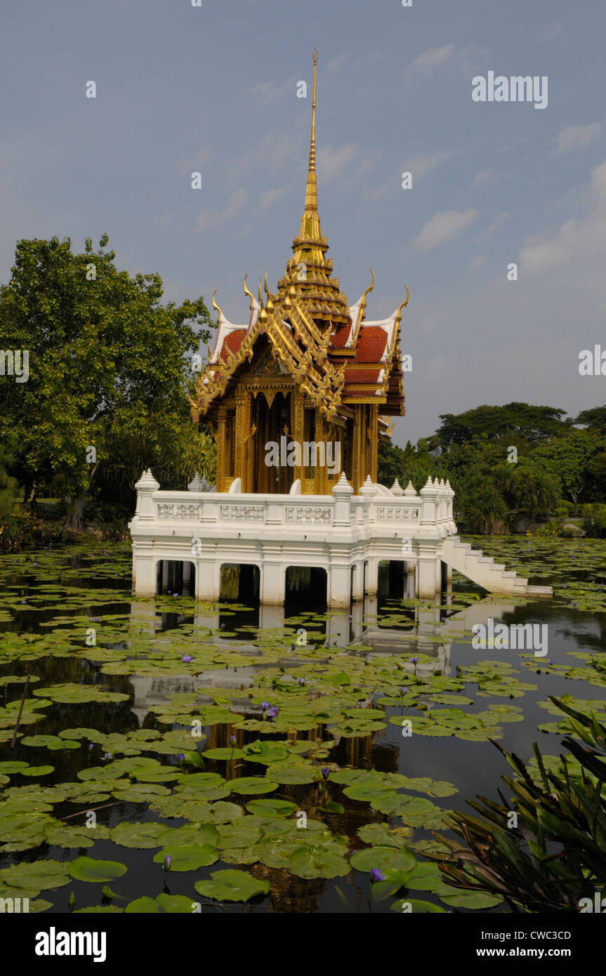 sunken traditional old style royal pavillion in lake full of lotus leaves, King Rama IX Park ,bangkok, thailand Stock Photo