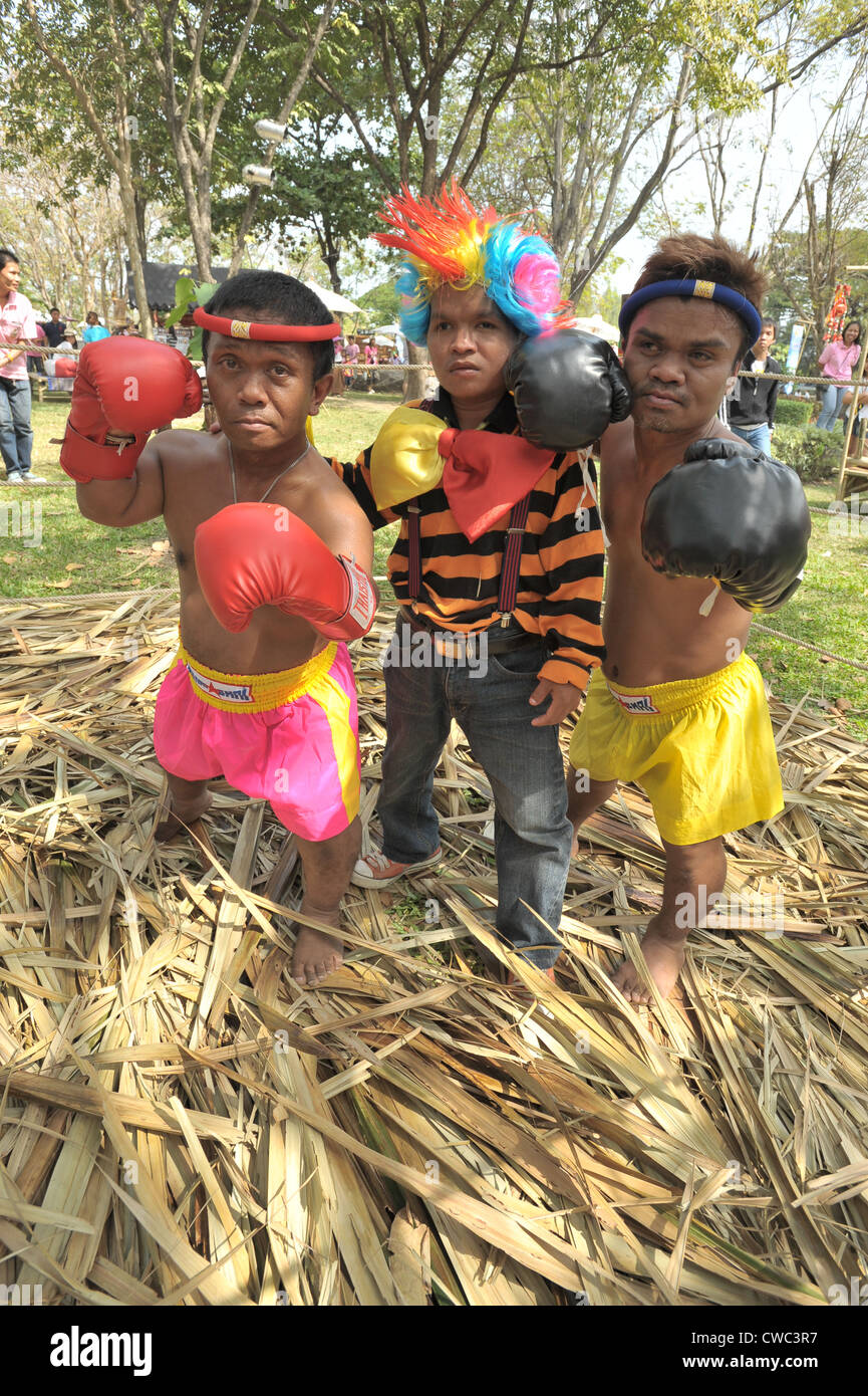 dwarf  thai kick boxers posing during the kings birthday,  King Rama IX Park ,bangkok, thailand Stock Photo