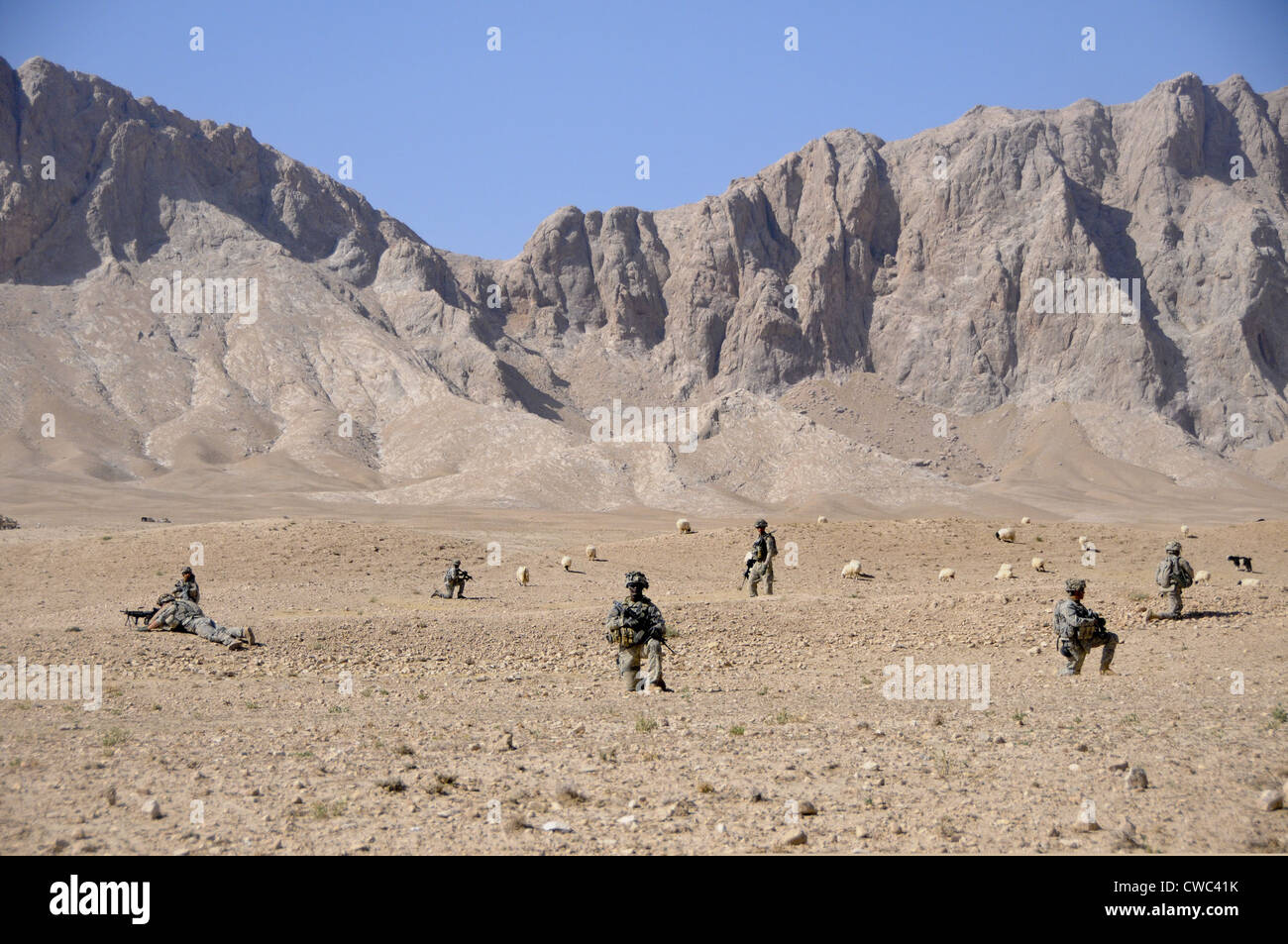 U.S. Soldiers with take a security halt during a patrol off Highway 1 in Zabul province Afghanistan Oct. 18 2010., Photo Stock Photo