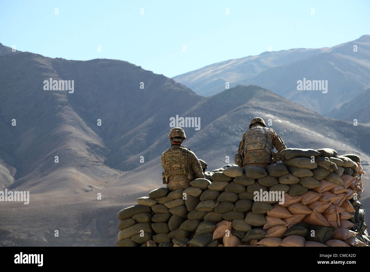 U.S. Army soldiers run communications equipment from a sandbag bunker in the Daymirdad District Center Wardak province Stock Photo