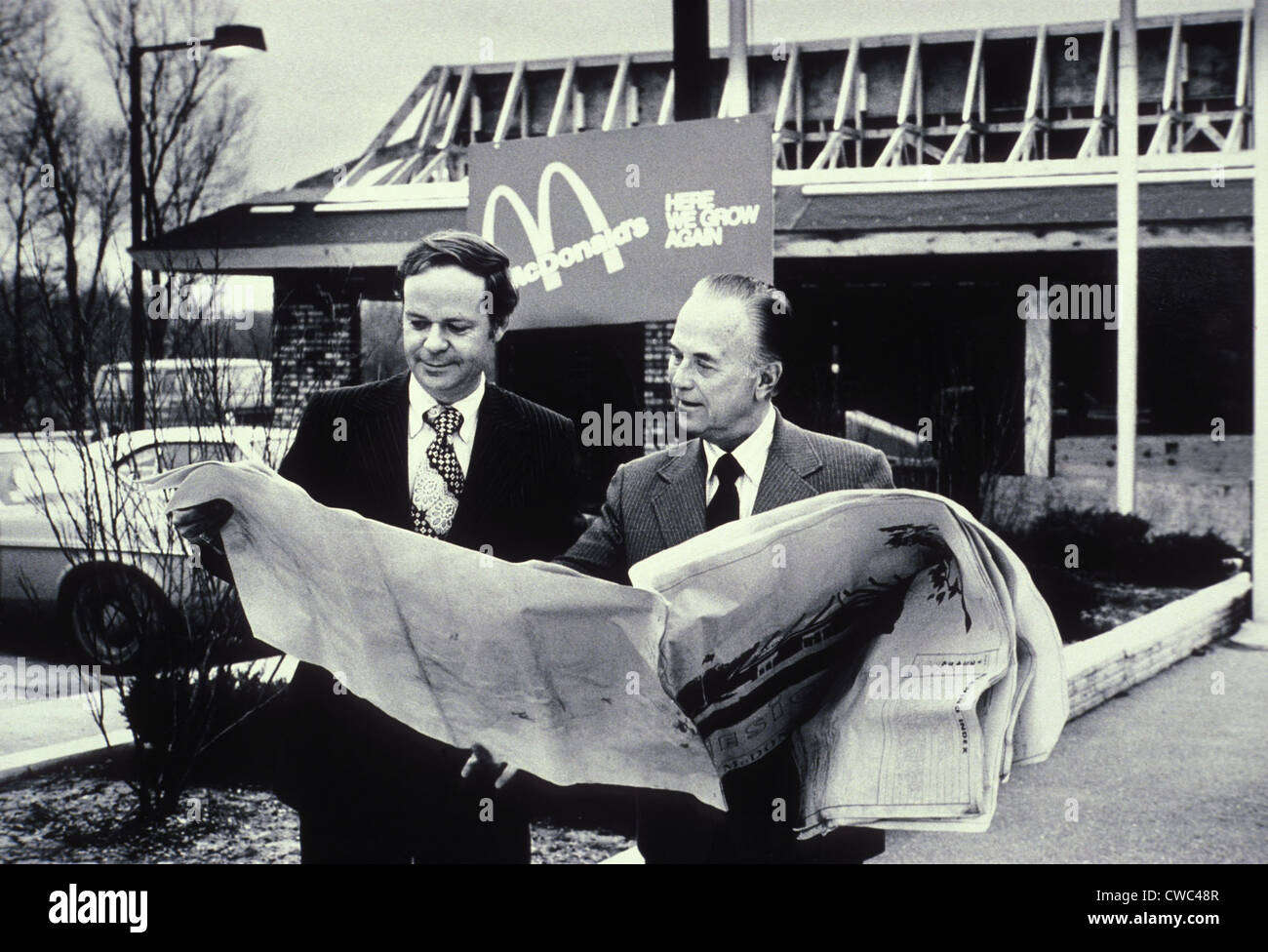 Fred Turner and Ray Kroc the executive leaders of McDonald's Corporation looking at blueprints of future restaurant. McDonald's Stock Photo