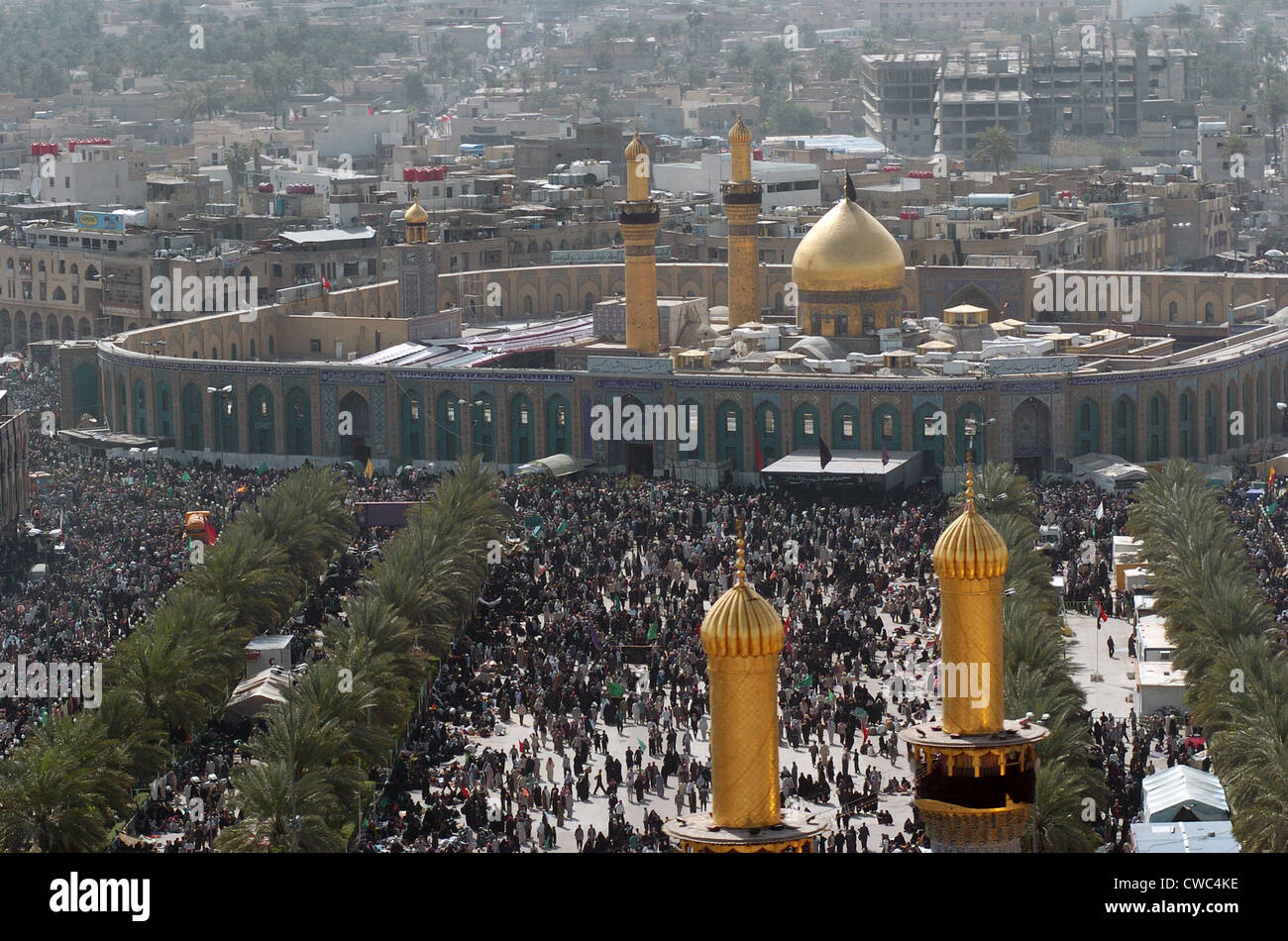 Shia Muslims around the Husayn Mosque in Karbala Iraq after making a pilgrimage in observance of the Arba'een holiday a forty Stock Photo