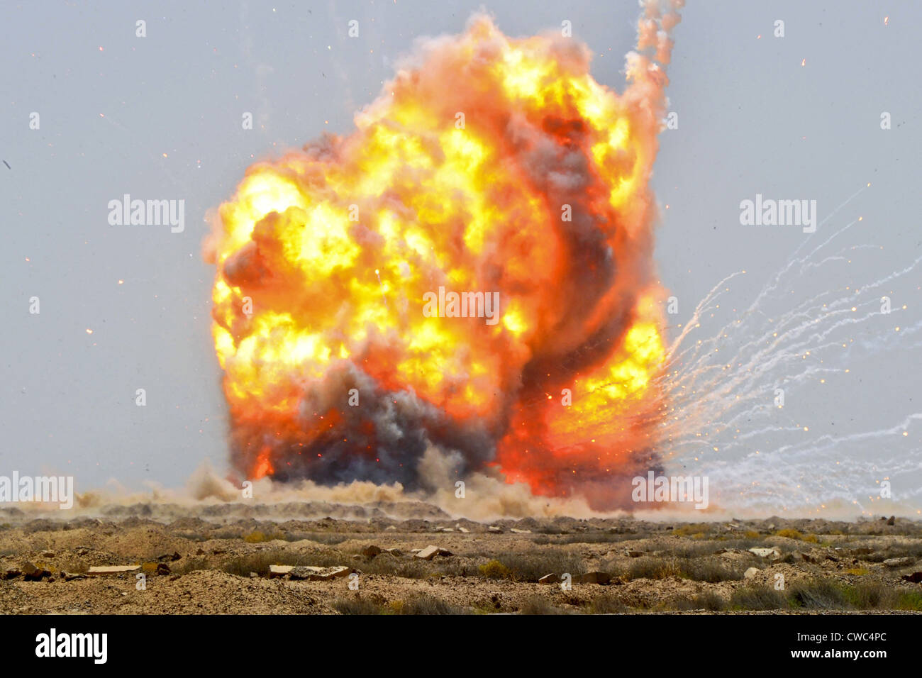 A controlled detonation of captured explosives set off by US and Iraqi soldiers outside Bassami Iraq July 13 2010. Stock Photo