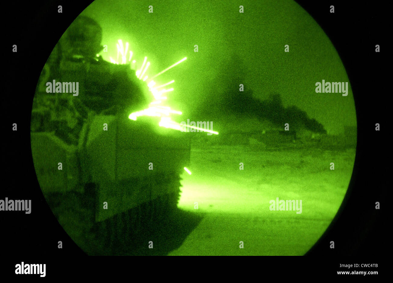 An Army Bradley Fighting Vehicle opens fire on anti-coalition forces during in Samarra Iraq on Sept. 30 2004. Stock Photo