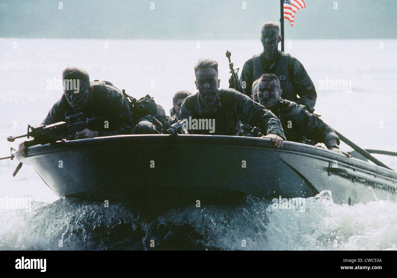 This photograph of six armed US soldiers in a small boat speeding across the water was taken by Corporal Cheresa Clark and won Stock Photo