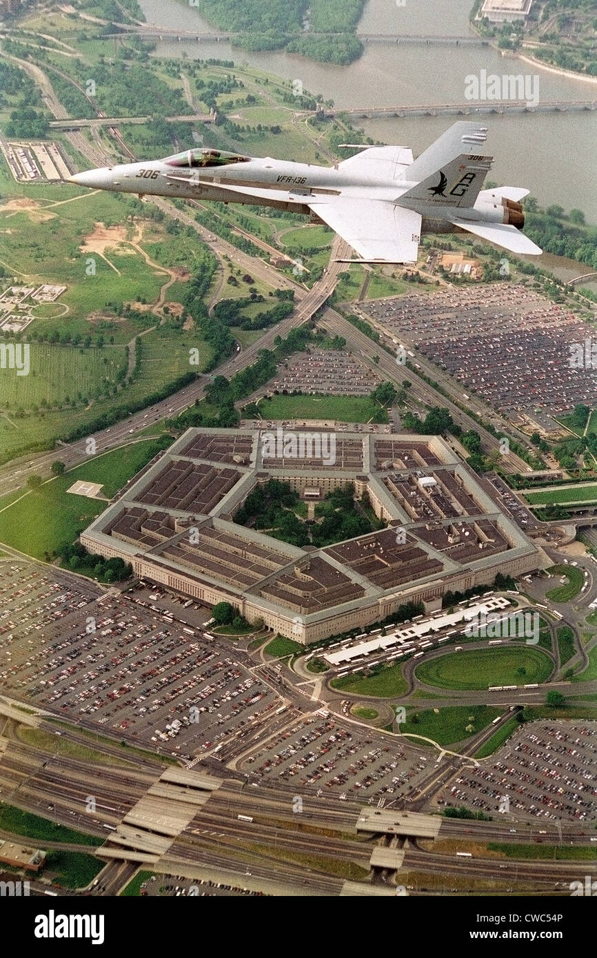 F-18 Hornet fighter flies over the Pentagon. (BSLOC 2011 12 319) Stock Photo