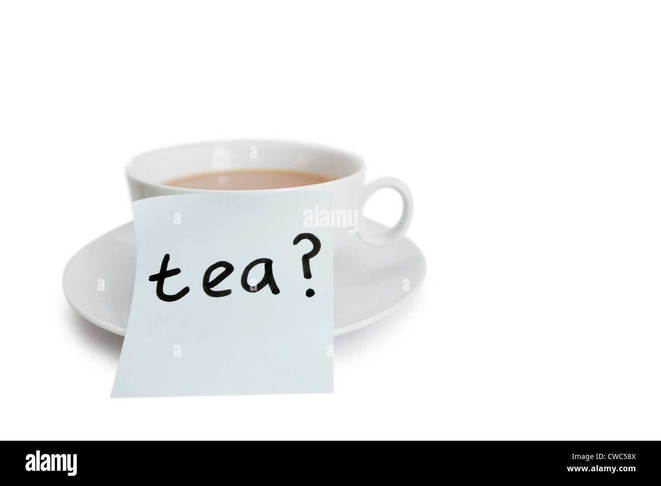 Close-up of sticky notepaper with teacup over white background Stock Photo