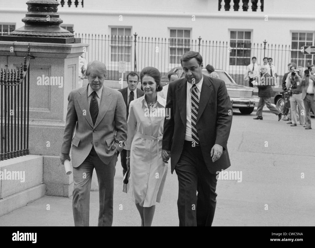 President Jimmy Carter with his close friend Georgia banker Bert Lance and his wife LaBelle. Lance was forced to resign his Stock Photo