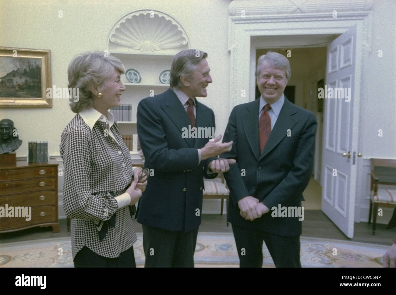President Jimmy Carter greets actor Kirk Douglas and his wife Mrs. Anne Buydens Douglas. March 16 1978. Stock Photo