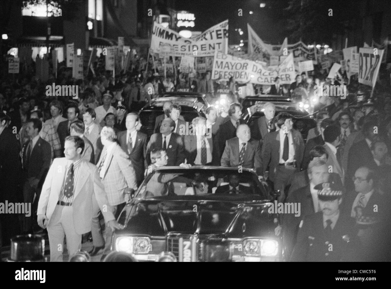 Jimmy Carter and Mayor Richard J. Daley ride in a torchlight parade during a campaign stop in Chicago Illinois. Sept. 9. 1976. Stock Photo