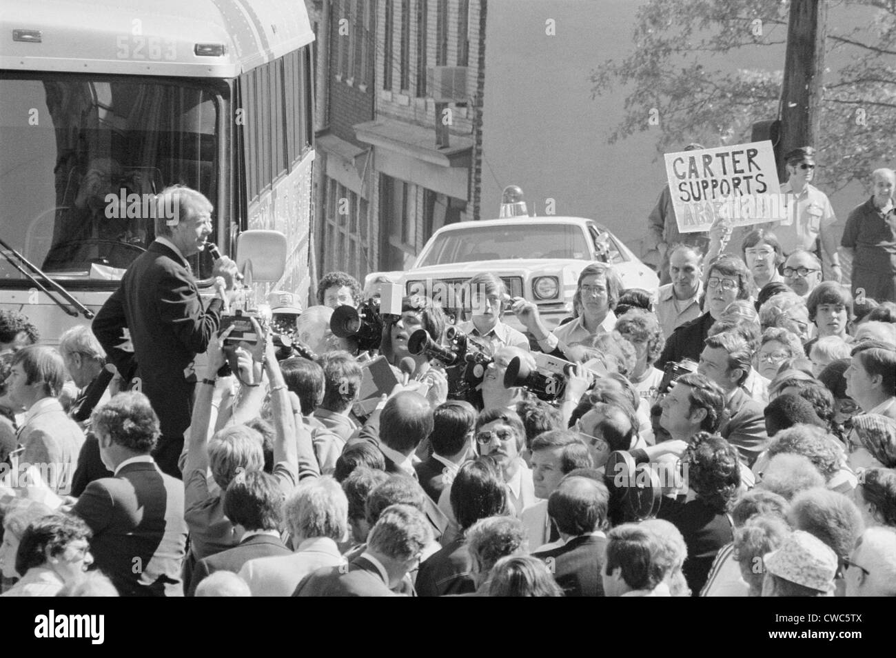 Presidential candidate Jimmy Carter speaking to a crowd at a campaign