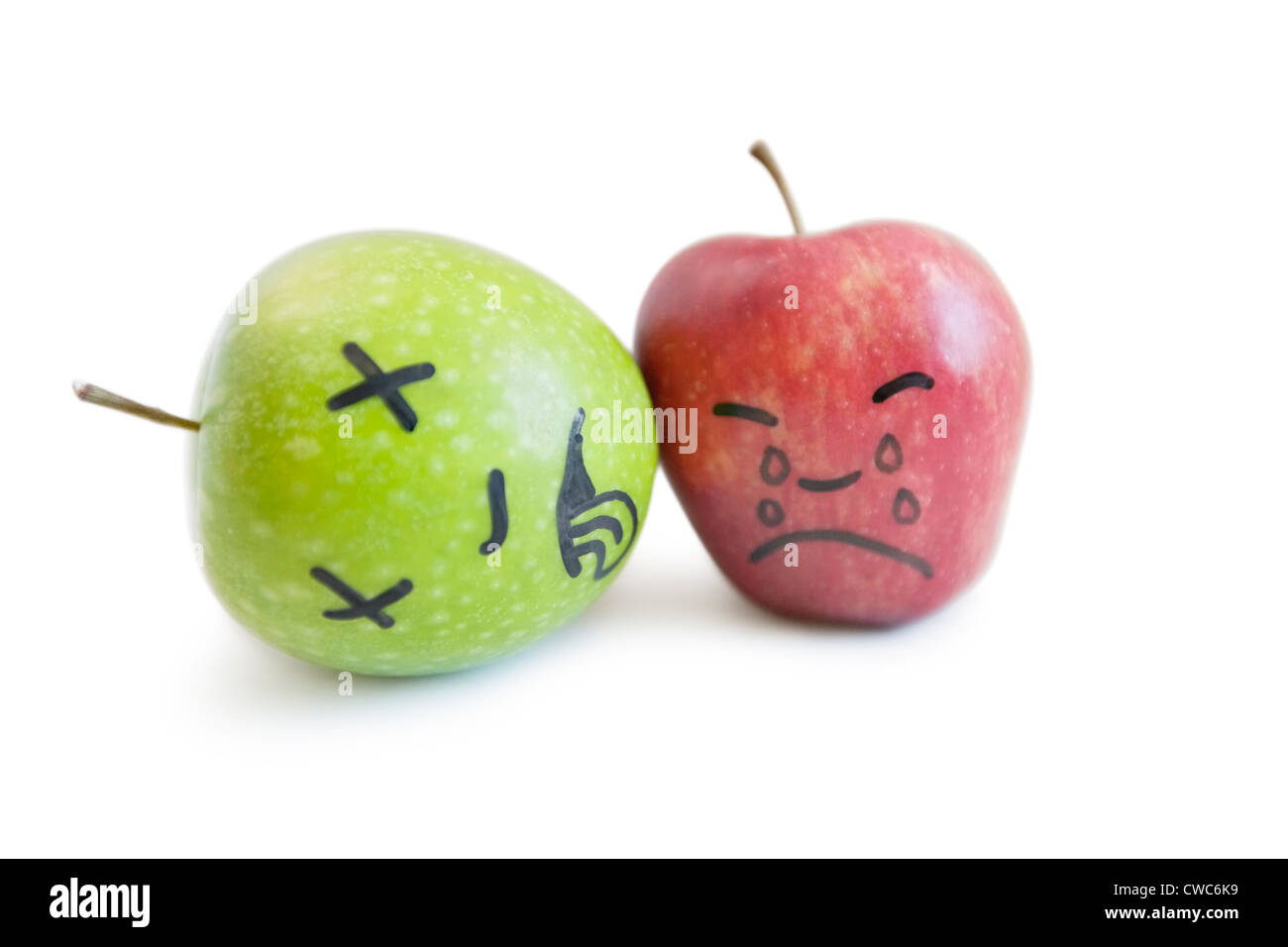 Red apple mourning over death Stock Photo