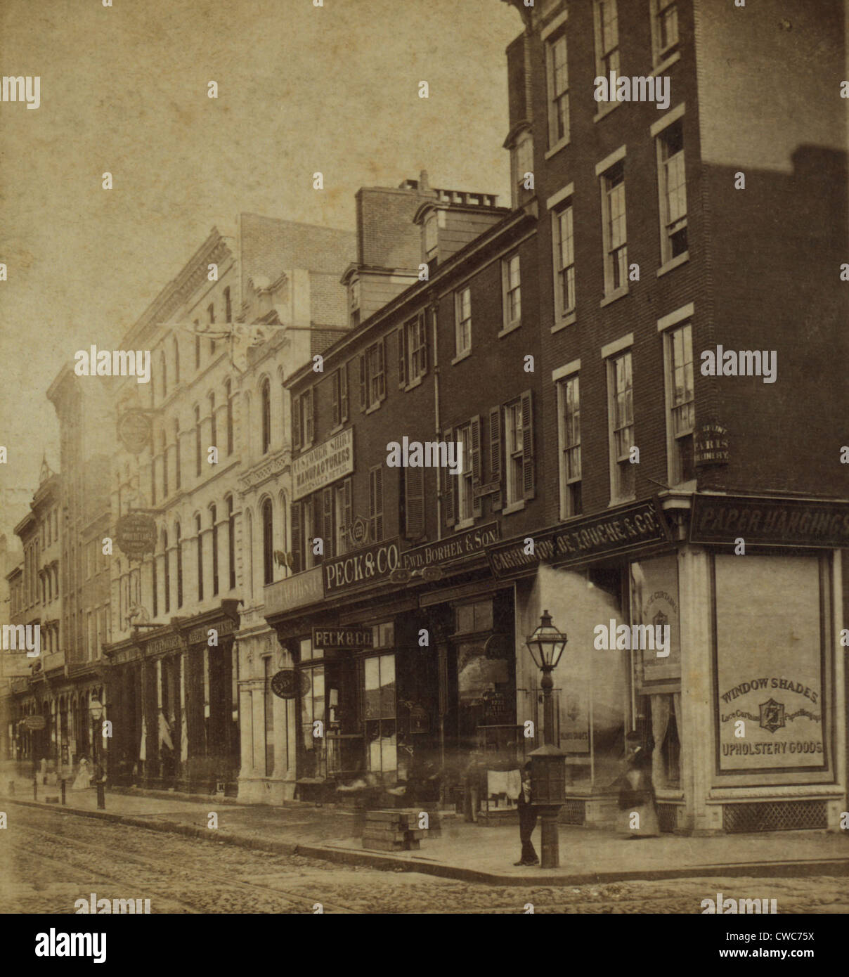 Philadelphia in 1870. Stereoscopic view of Chestnut Street below 11th street on the South Side. Shops sell consumer goods and Stock Photo