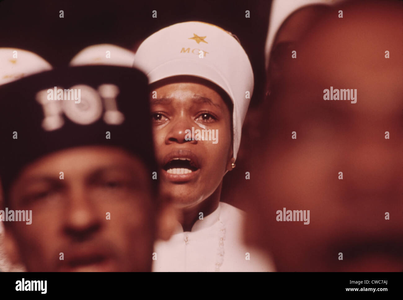 A Black Muslim Woman Reacts To Elijah Muhammad S Annual Savior S Day Message The Foi On The Cap Of The Man In Front Indicates Stock Photo Alamy Saviors Day 2022