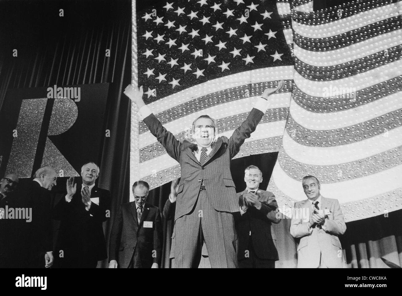 President Richard Nixon making his signature 'V' gesture at National