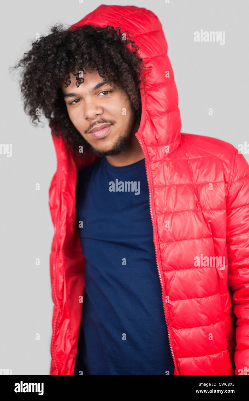 Person wearing red jacket hi-res stock photography and images - Alamy