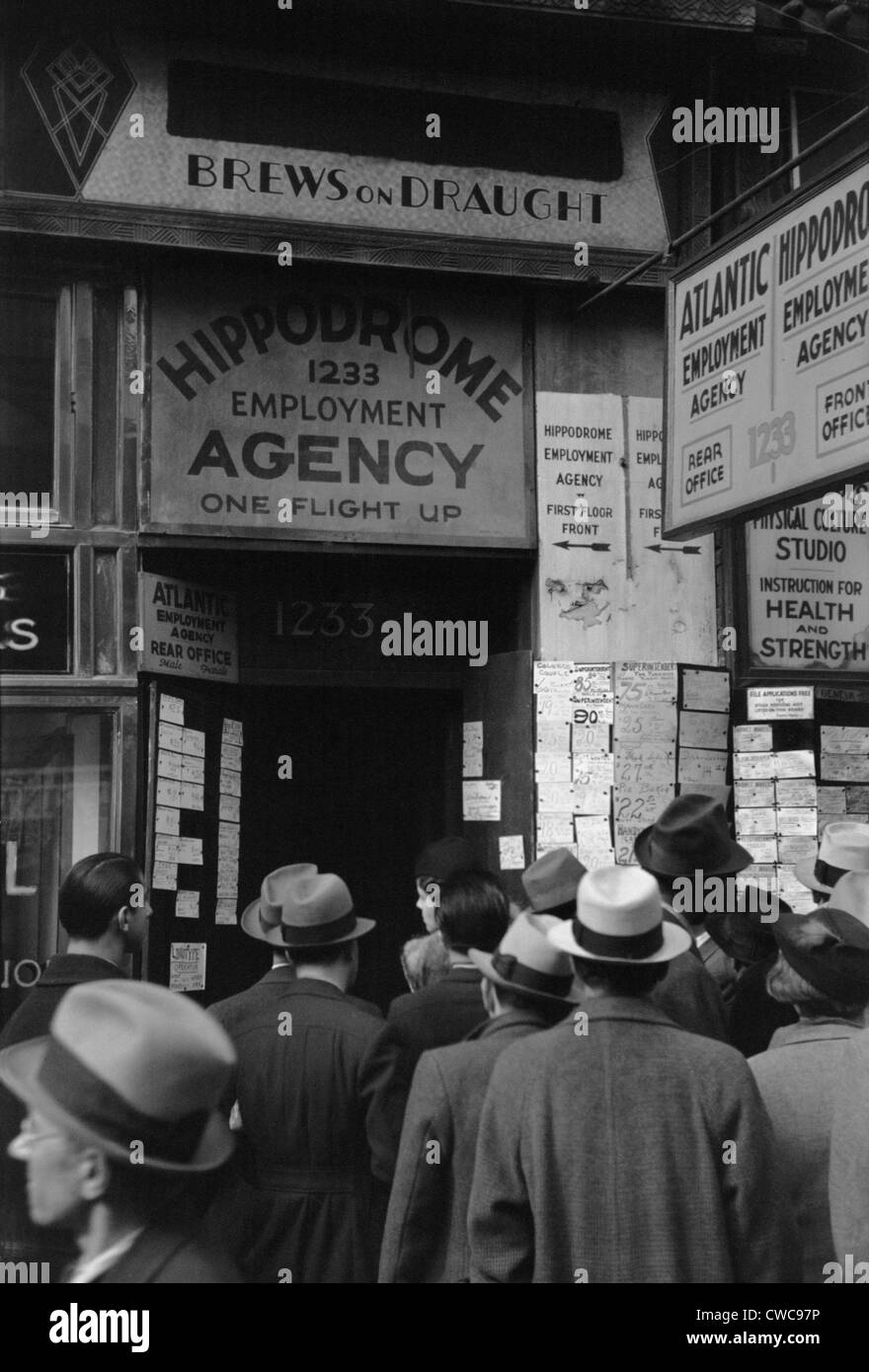 Crowd of job seekers at the Hippodrome Employment Agency at 1235 Sixth Avenue. New York City Dec. 1937. Stock Photo
