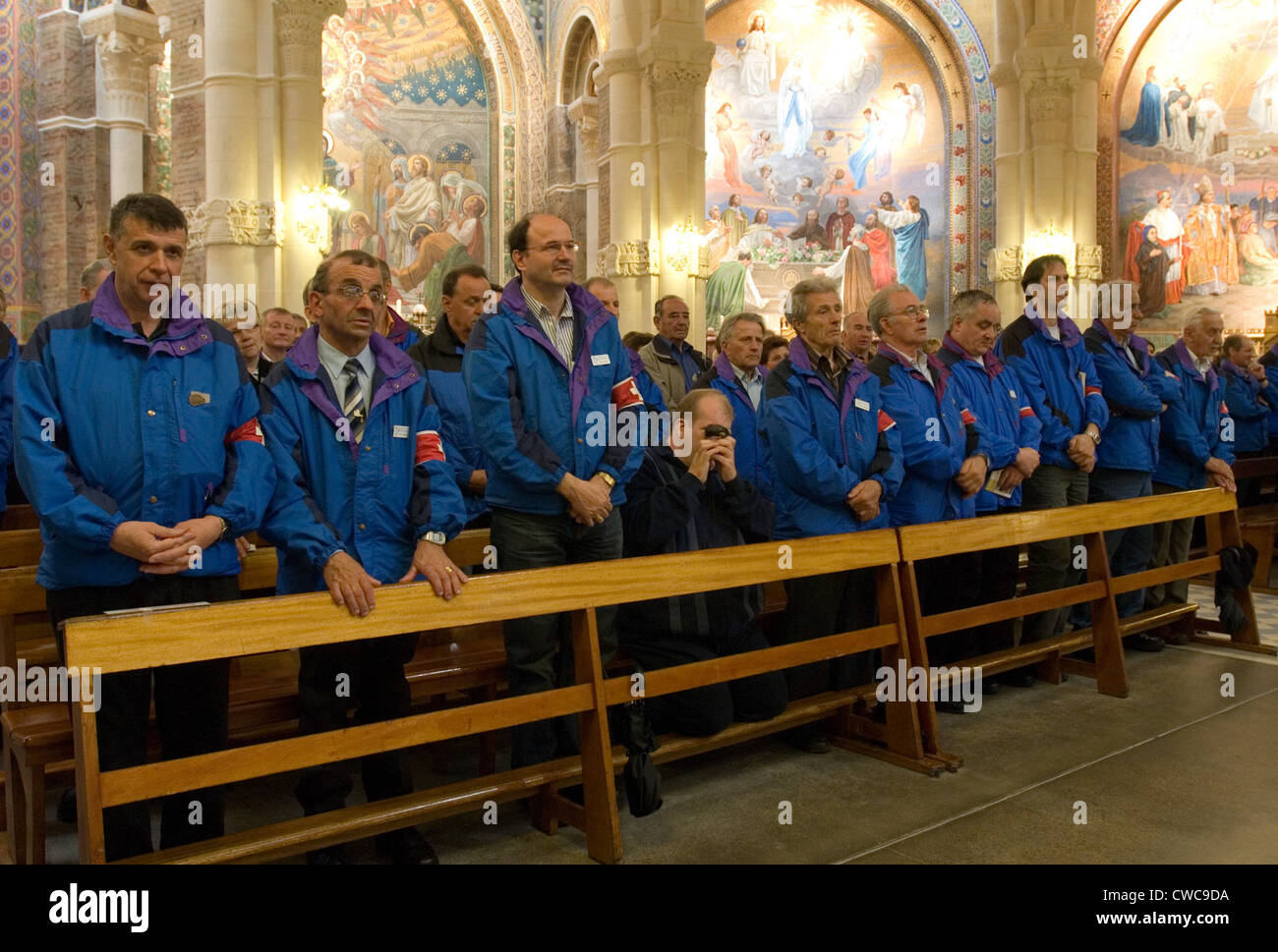 Mass in the Rosary Basilica in Lourdes, France Stock Photo
