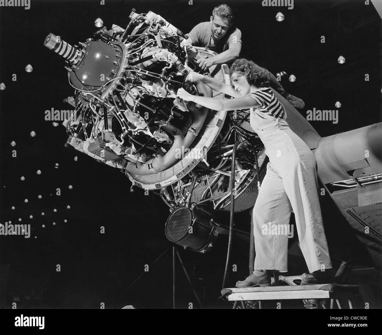 Man And Women Working Together At Douglas Aircraft Plant Long Beach