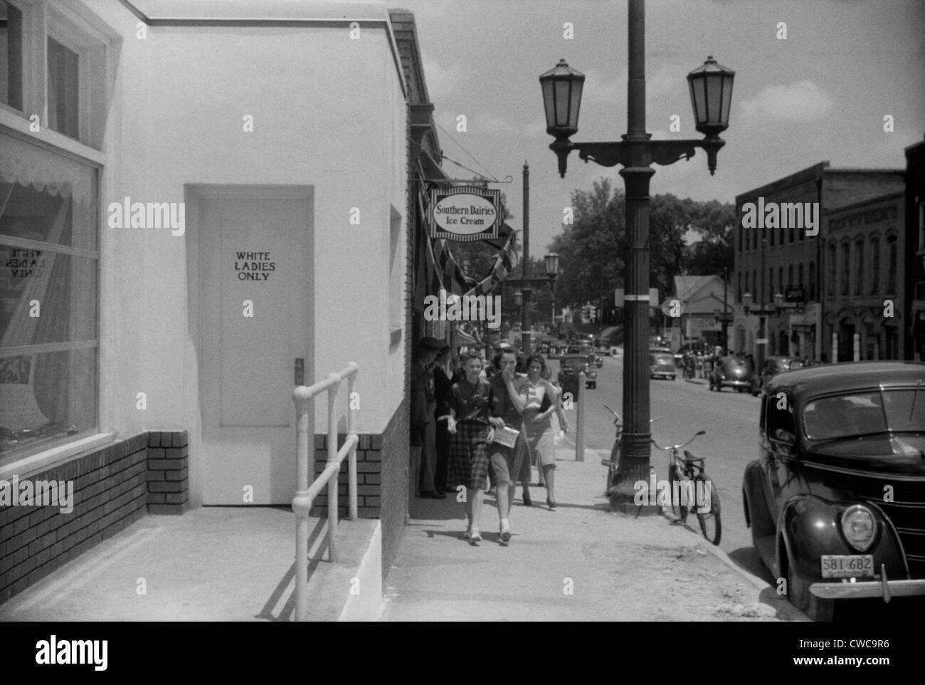 'White Ladies Only' sign on a public restroom on in Durham, North Carolina. May 1940. Stock Photo