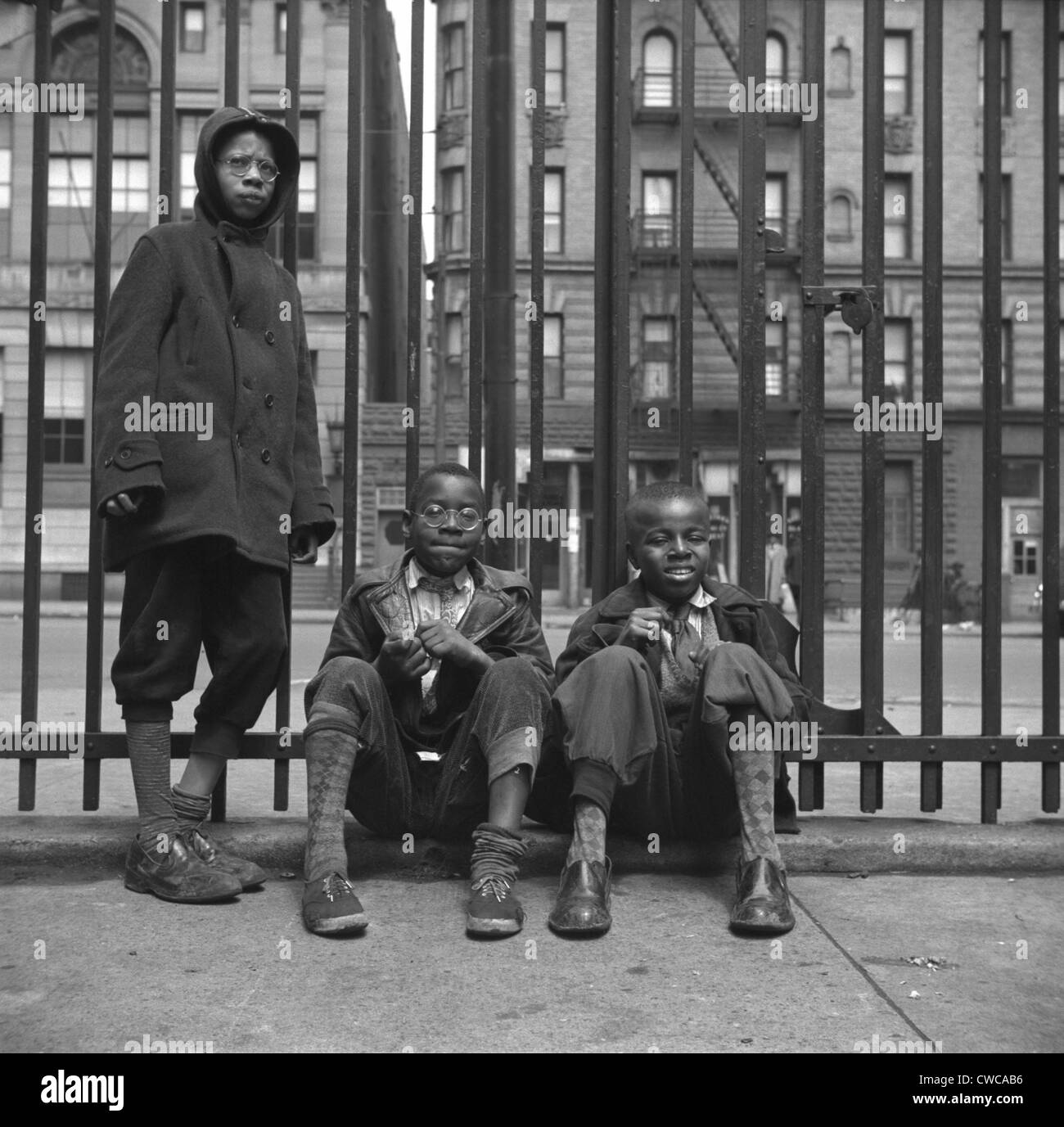 Three African American boys in Harlem. May 1943 photo by Gordon Parks. Stock Photo