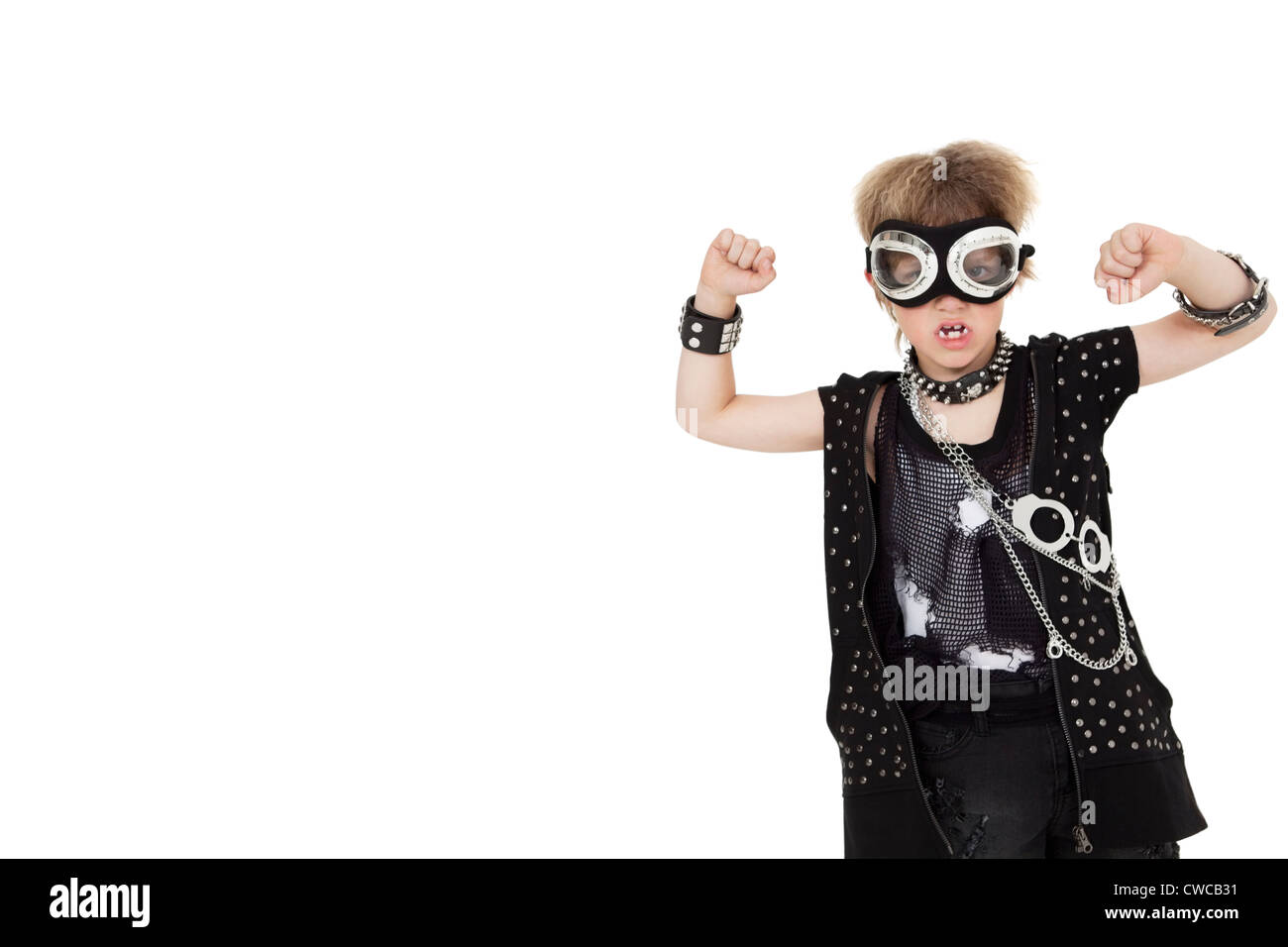 Front view of punk kid wearing pilot goggles with raised fist over