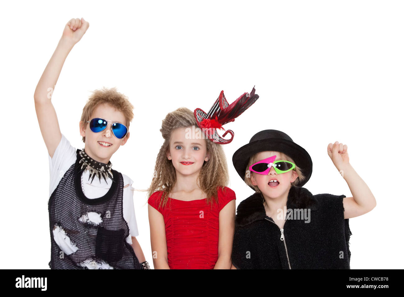 Portrait of kids fancy dress outfit with raised fist over white background  Stock Photo - Alamy