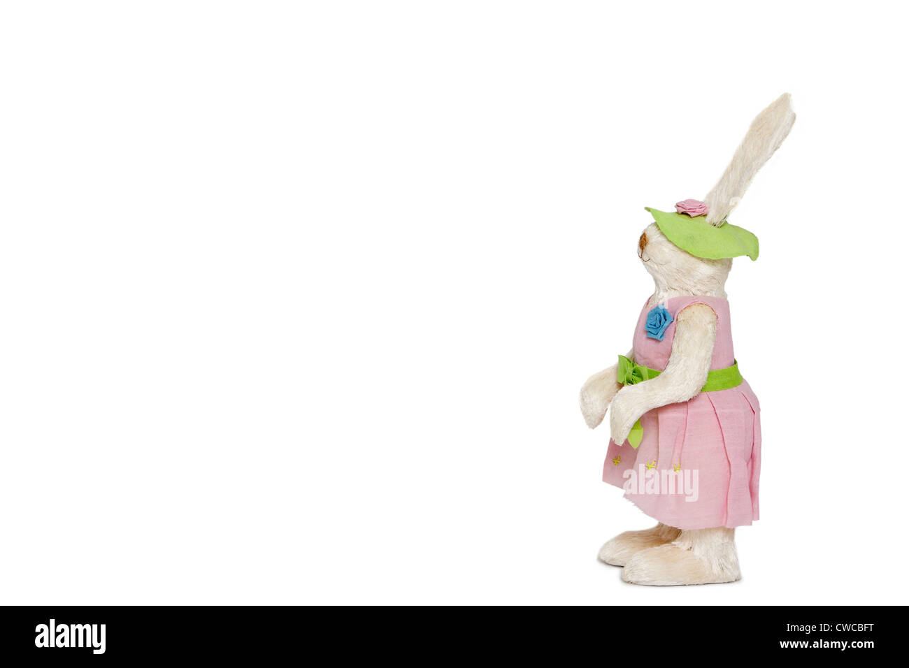 Side view of stuffed Bunny standing over white background Stock Photo