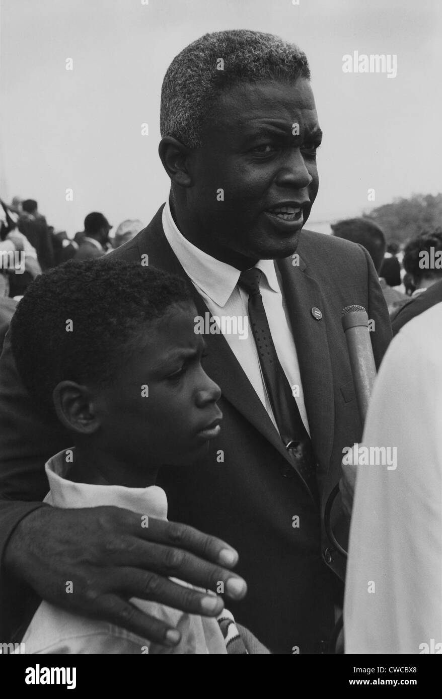 Baseball player Jackie Robinson with his son at the 1963 Civil Rights March on Washington. Aug. 28, 1963. Stock Photo