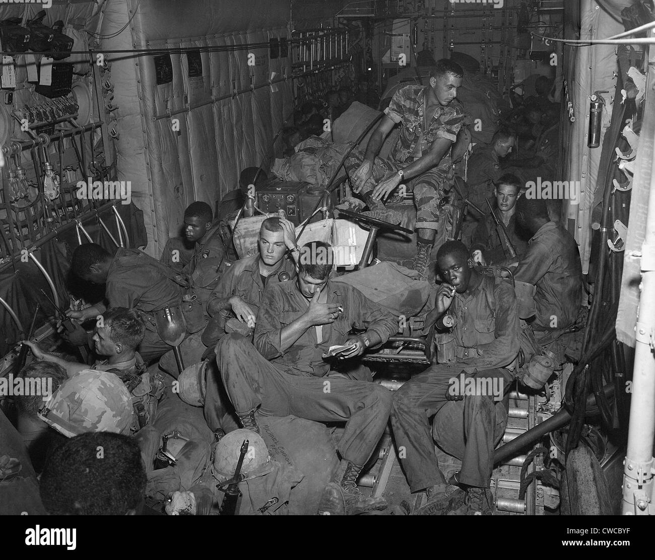 Vietnam War. 101st Airborne Division soldiers an a helicopter enroute to Phi Troung Air Base for a search and destroy mission Stock Photo