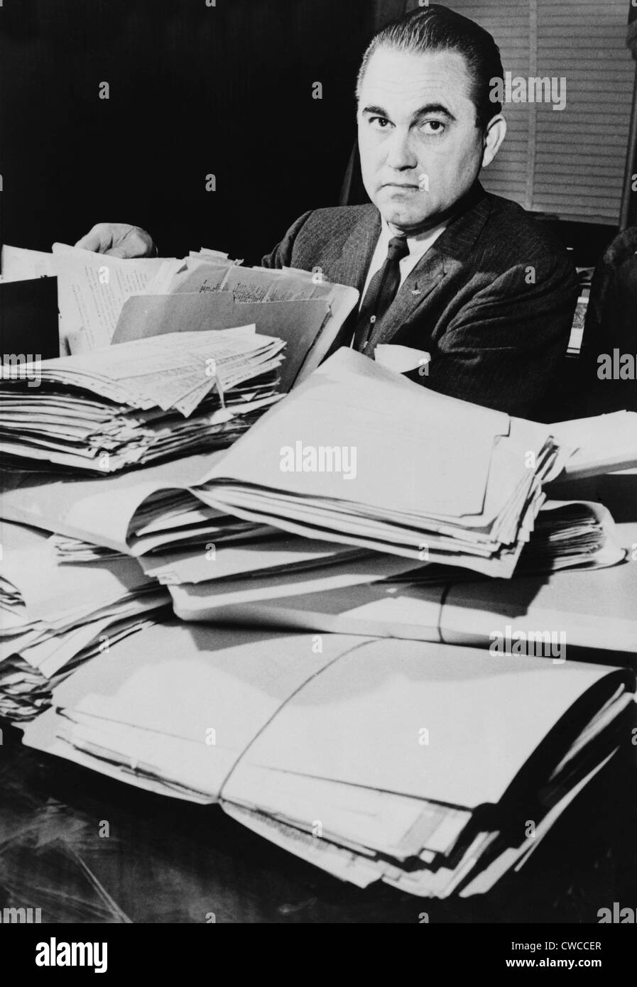 Segregationist Gov. George Wallace of Alabama is shown in his office during the first of his four terms as Alabama's populist Stock Photo