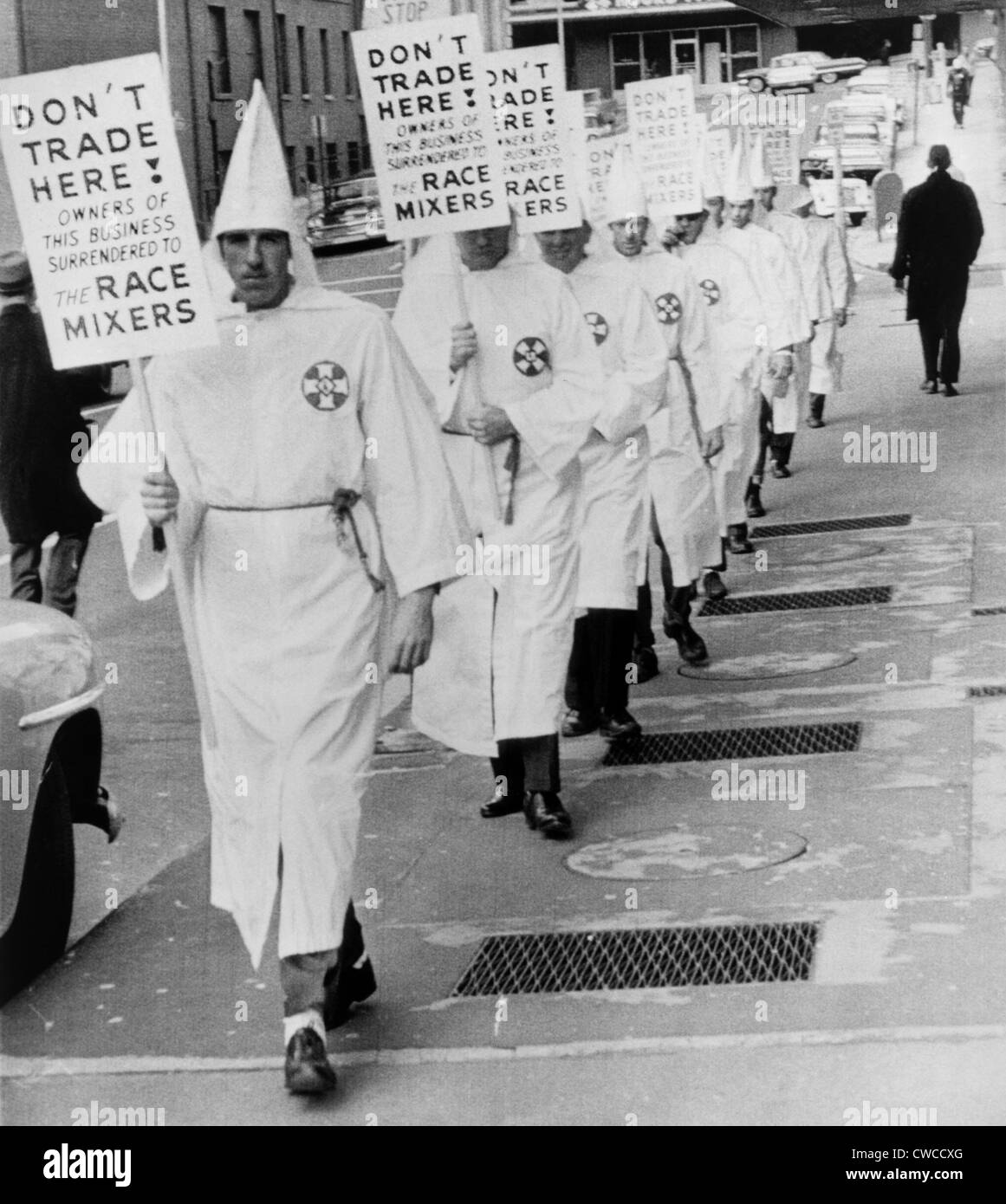 Ku Klux Klansmen picket newly desegregated hotel in Albany, Georgia. KKK was a militant minority intimidated moderates to Stock Photo