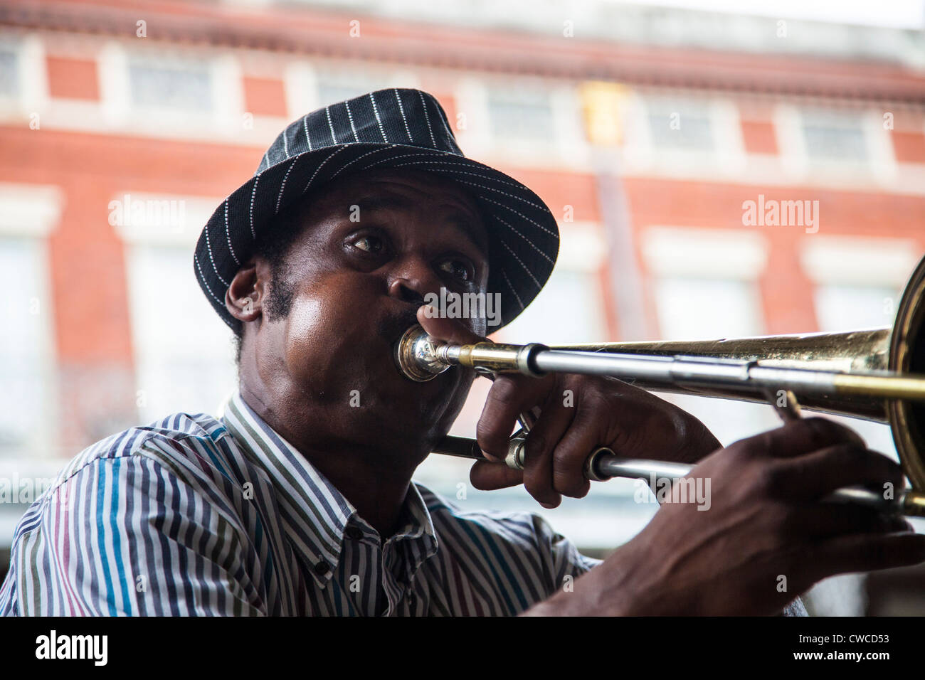 Jazz musician playing a trombone in the French Quarter, New Orleans, LA