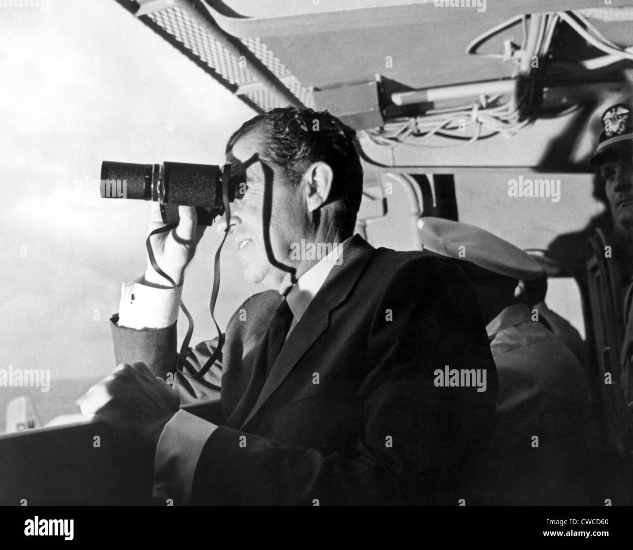 President Richard Nixon watches Apollo 11 splashdown. On the USS Hornet aircraft carrier, Nixon watches the Lunar Mission Stock Photo