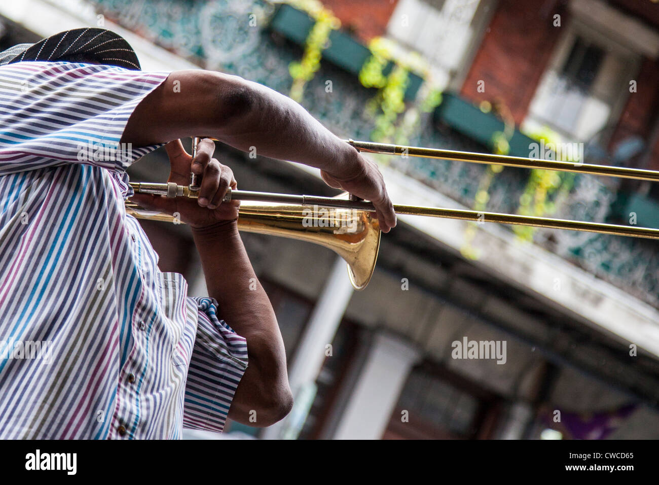 Jazz musician playing a trombone in the French Quarter, New Orleans, LA